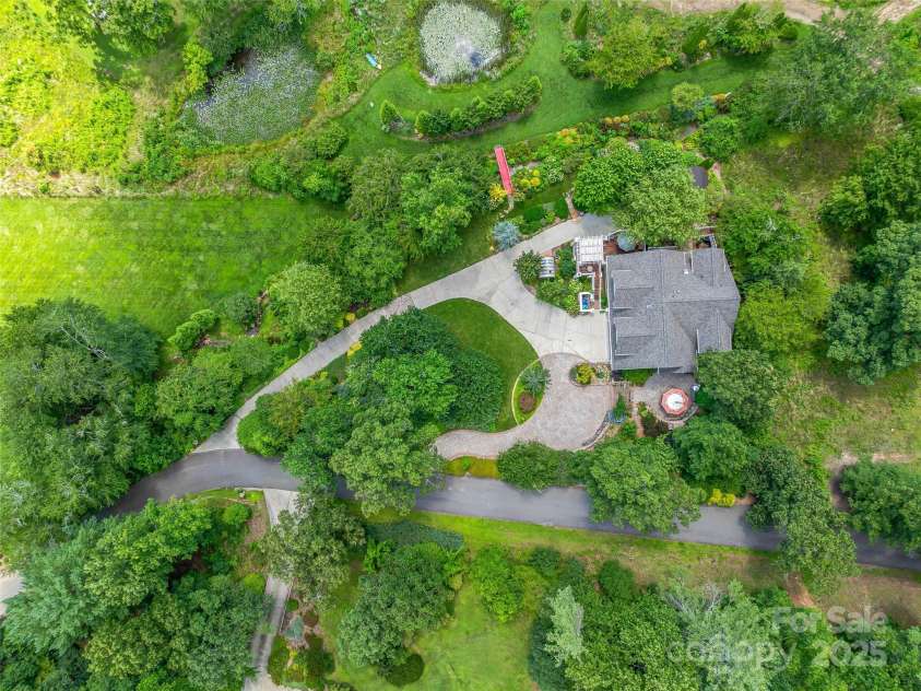 212 Plains Drive, Asheville, NC 28803.  MLS# CAR4284711, YatesRealty ID 29898. Stunning Luxury Home on .92 acre in gated Keswick Hills