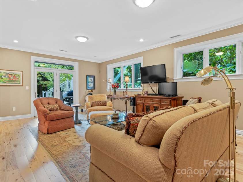 212 Plains Drive, Asheville, NC 28803.  MLS# CAR4284711, YatesRealty ID 29898. Terrace level family room