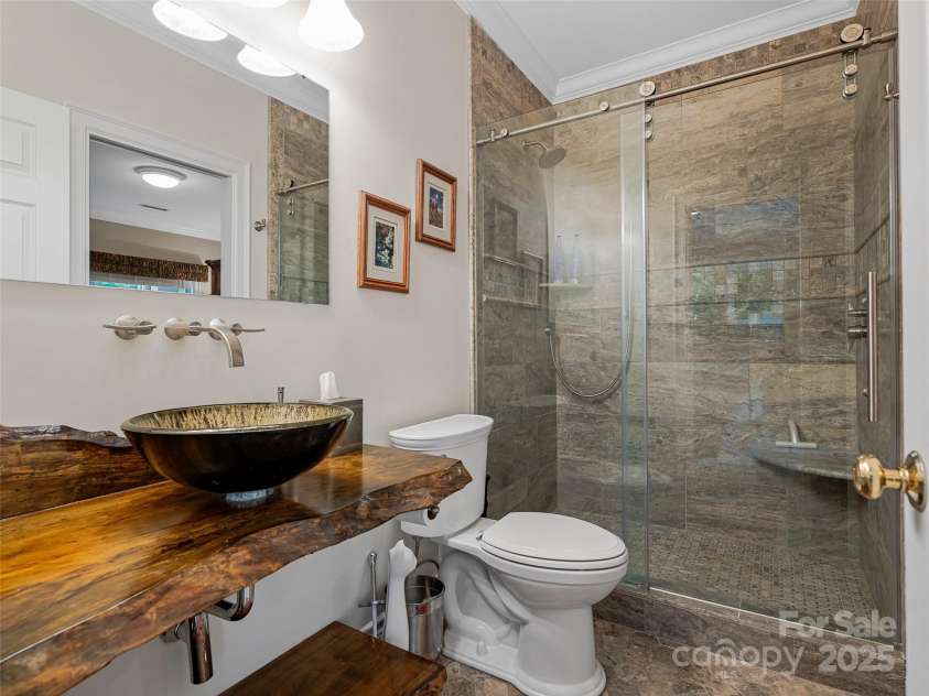 212 Plains Drive, Asheville, NC 28803.  MLS# CAR4284711, YatesRealty ID 29898. Terrace primary suite bath