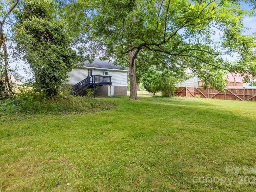 406 Main Street, Clover, SC 29710.  MLS# CAR4279553, YatesRealty ID 29899. Back yard