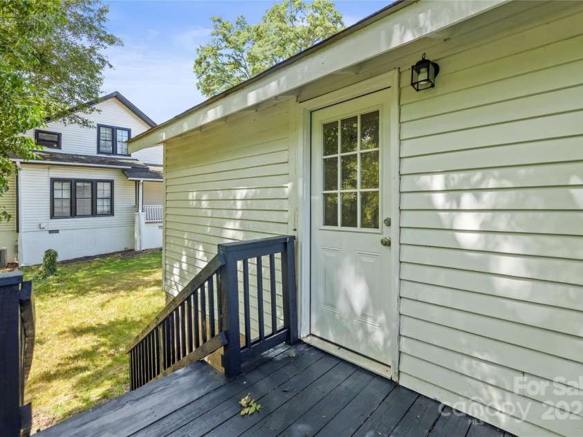 406 Main Street, Clover, SC 29710.  MLS# CAR4279553, YatesRealty ID 29899. Newly stained back deck off the kitchen