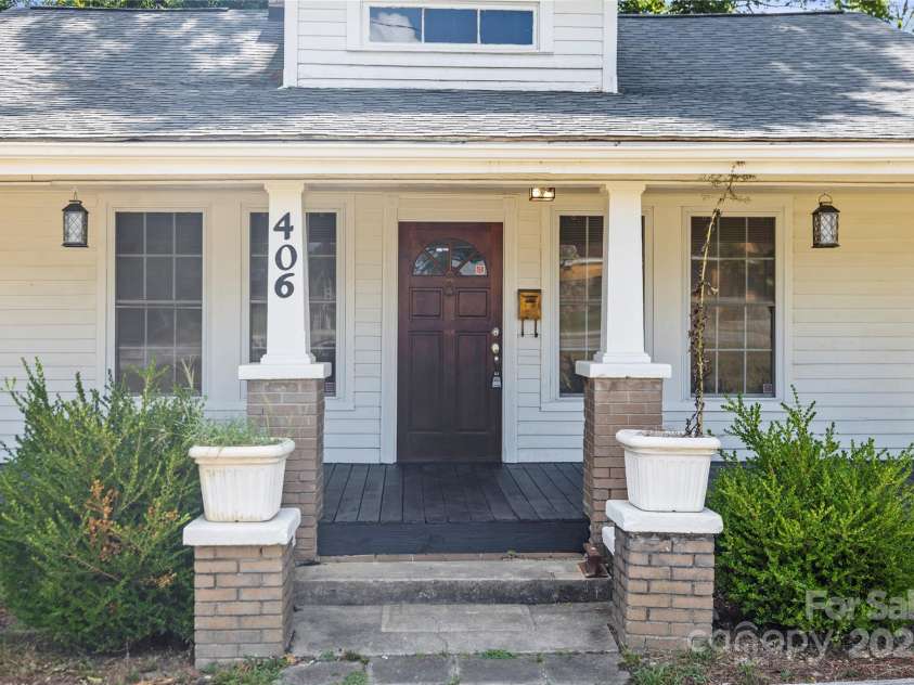 406 Main Street, Clover, SC 29710.  MLS# CAR4279553, YatesRealty ID 29899. Welcoming covered porch