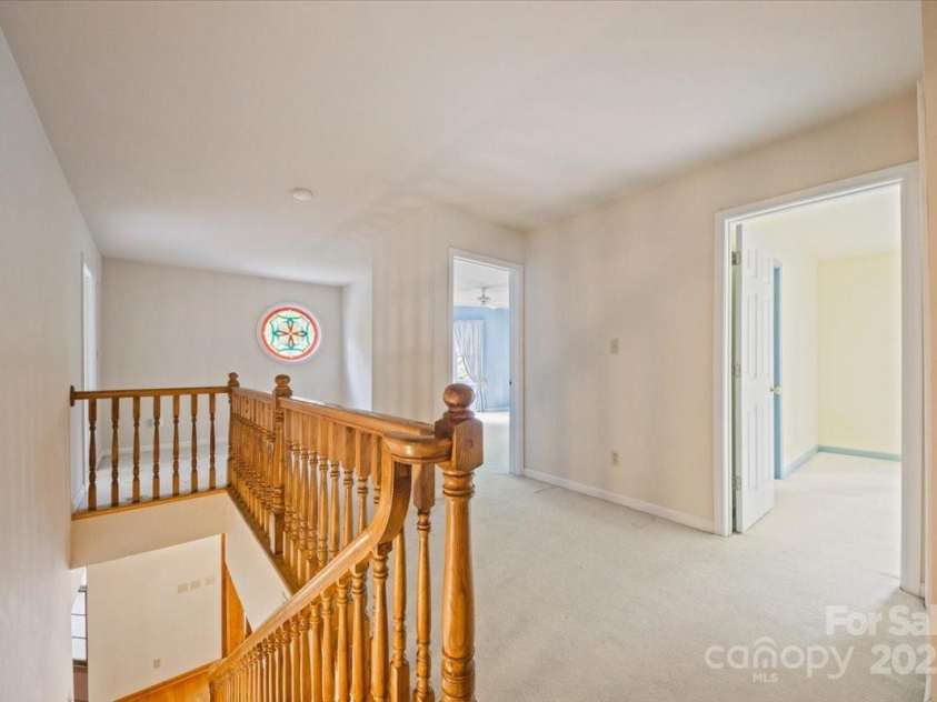 5580 Greenville Highway, Brevard, NC 28712.  MLS# CAR4196657, YatesRealty ID 299. Upstairs sitting area