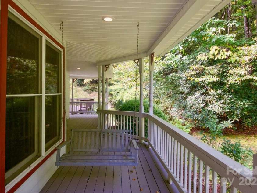 5580 Greenville Highway, Brevard, NC 28712.  MLS# CAR4196657, YatesRealty ID 299. Wrap around porch