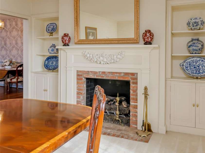 25 Ridgefield Place, Asheville, NC 28803.  MLS# CAR4214349, YatesRealty ID 2990. Dining room gas fireplace