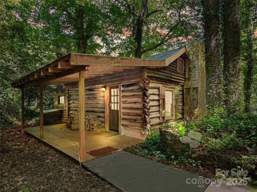 755 Pearson Falls Road, Saluda, NC 28773.  MLS# CAR4279313, YatesRealty ID 29902. 