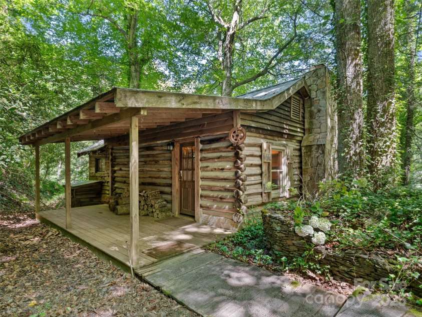 755 Pearson Falls Road, Saluda, NC 28773.  MLS# CAR4279313, YatesRealty ID 29902. 