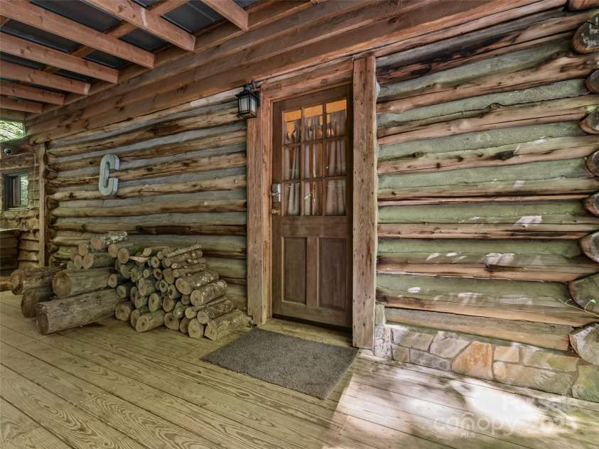 755 Pearson Falls Road, Saluda, NC 28773.  MLS# CAR4279313, YatesRealty ID 29902. 