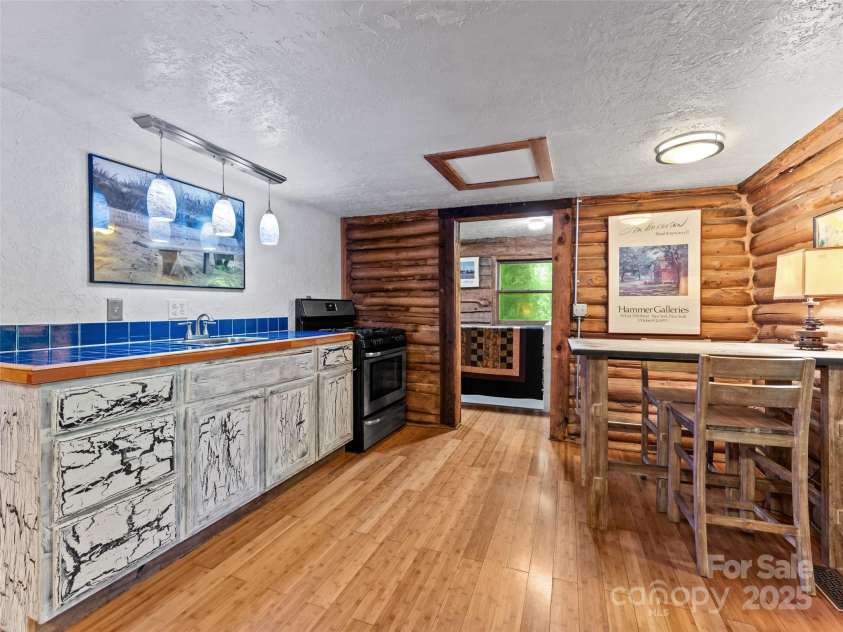 755 Pearson Falls Road, Saluda, NC 28773.  MLS# CAR4279313, YatesRealty ID 29902. 