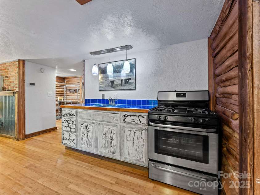 755 Pearson Falls Road, Saluda, NC 28773.  MLS# CAR4279313, YatesRealty ID 29902. 