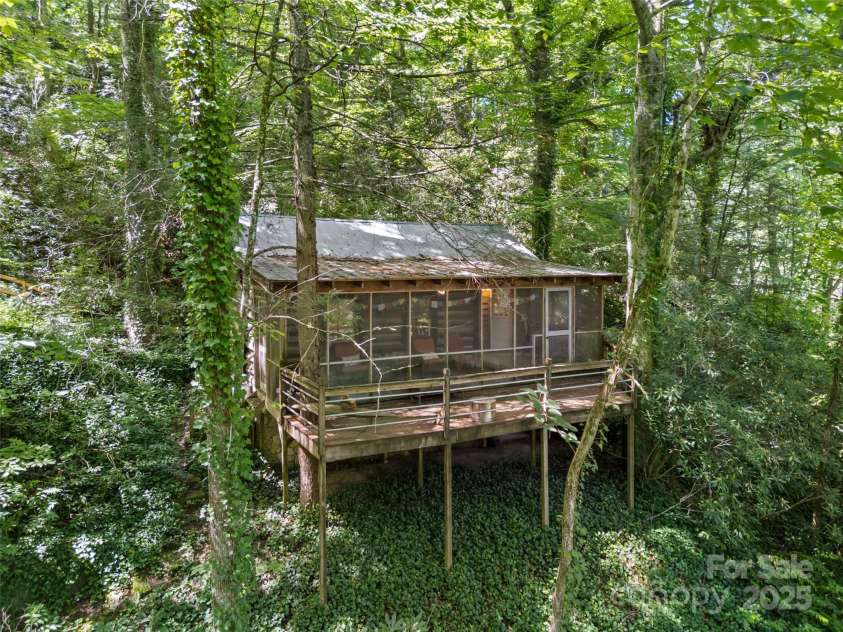 755 Pearson Falls Road, Saluda, NC 28773.  MLS# CAR4279313, YatesRealty ID 29902. 