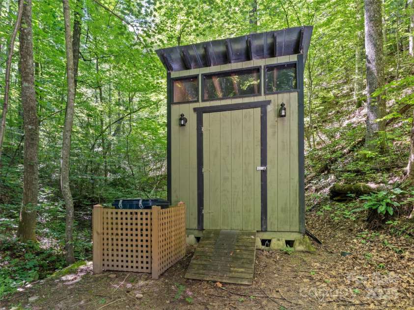 755 Pearson Falls Road, Saluda, NC 28773.  MLS# CAR4279313, YatesRealty ID 29902. 