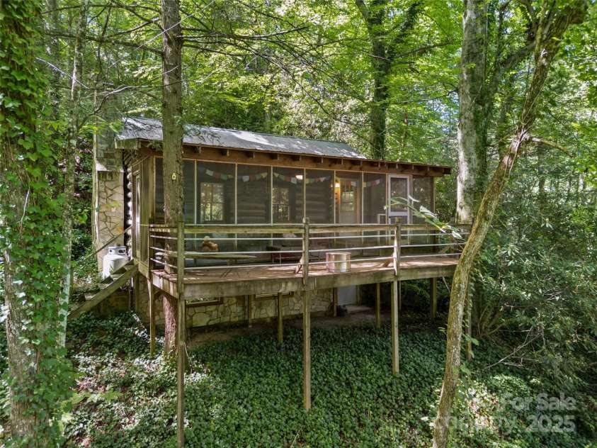 755 Pearson Falls Road, Saluda, NC 28773.  MLS# CAR4279313, YatesRealty ID 29902. 