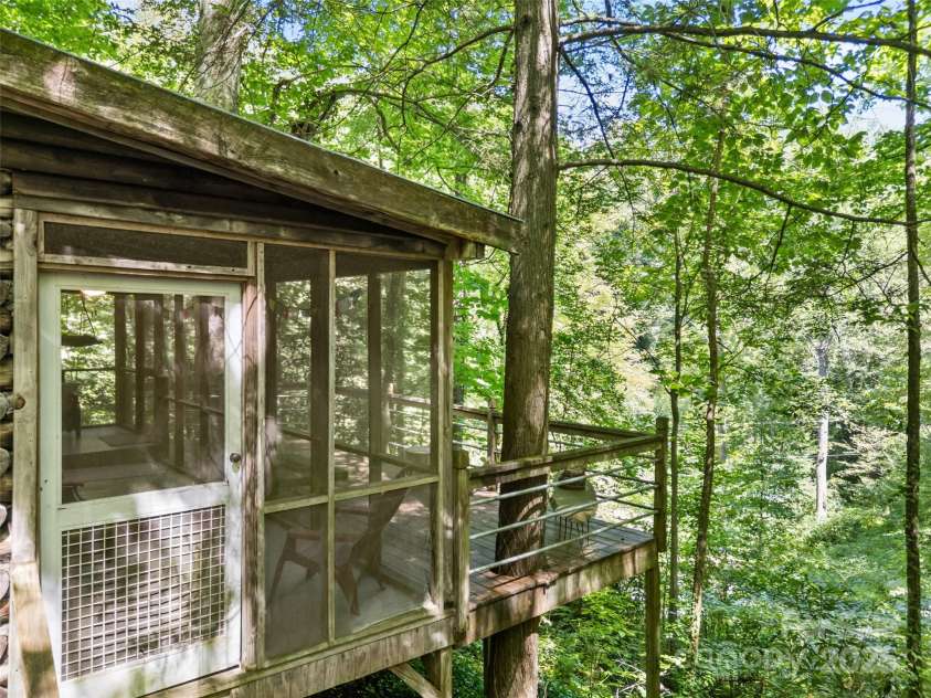 755 Pearson Falls Road, Saluda, NC 28773.  MLS# CAR4279313, YatesRealty ID 29902. 