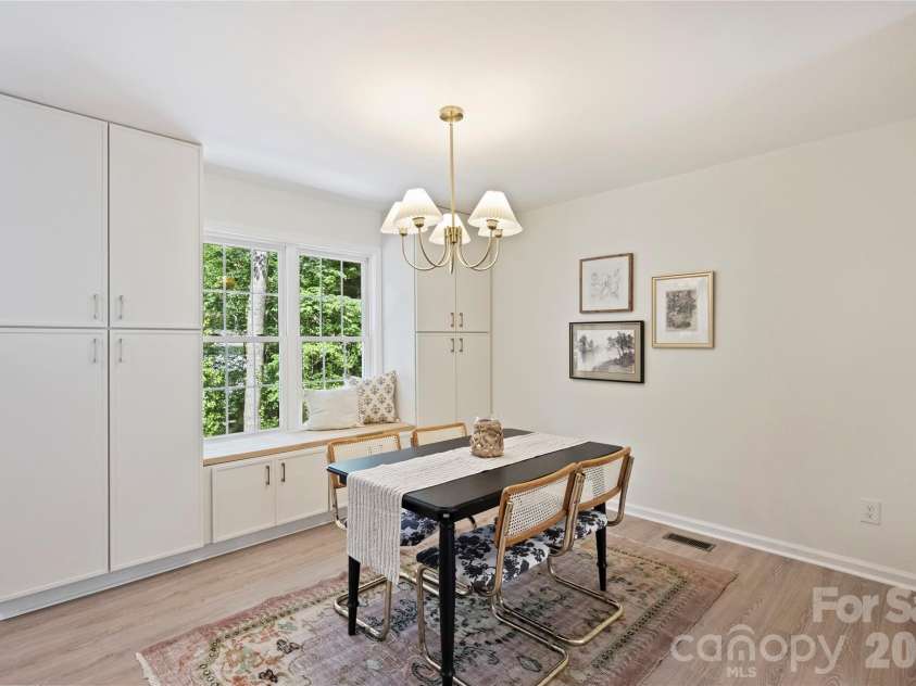 7420 Castlebar Road, Charlotte, NC 28270.  MLS# CAR4382970, YatesRealty ID 29905. Dining space with built-ins that provide ample storage.