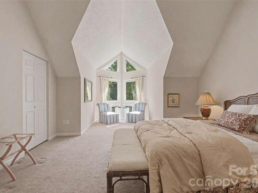 104 Overlook Drive, Flat Rock, NC 28731.  MLS# CAR4418068, YatesRealty ID 2991. Ensuite Bedroom Upper Level