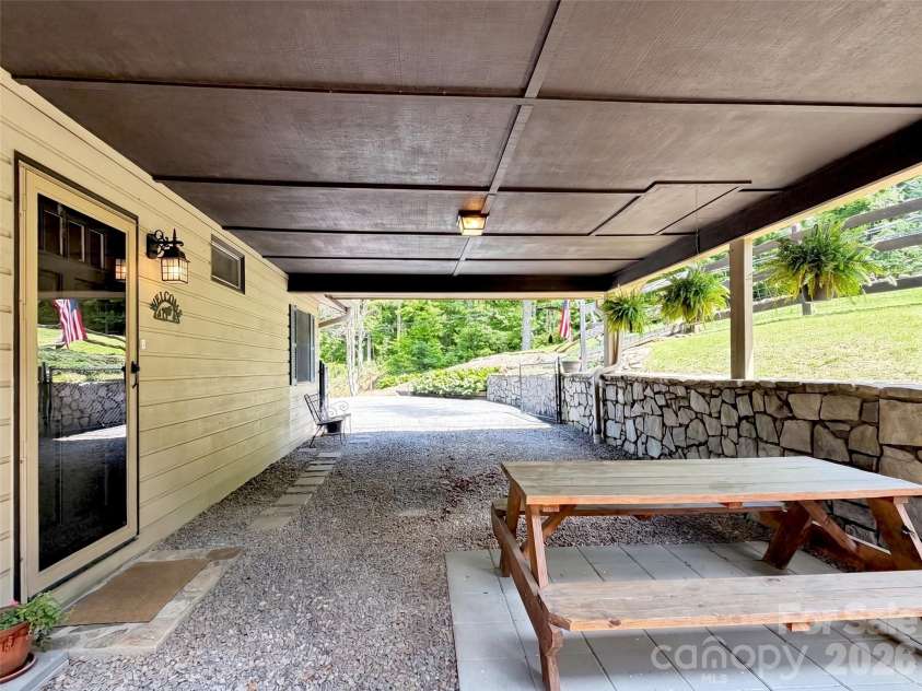 72 Sanctuary Road, Maggie Valley, NC 28751.  MLS# CAR4387632, YatesRealty ID 29910. LARGE CARPORT