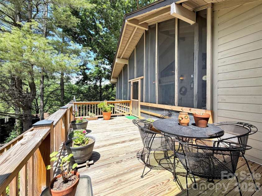 72 Sanctuary Road, Maggie Valley, NC 28751.  MLS# CAR4387632, YatesRealty ID 29910. LARGE OPEN DECK