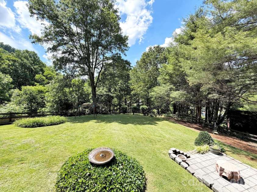 72 Sanctuary Road, Maggie Valley, NC 28751.  MLS# CAR4387632, YatesRealty ID 29910. LOVELY LANDSCAPING AND FIRE PIT