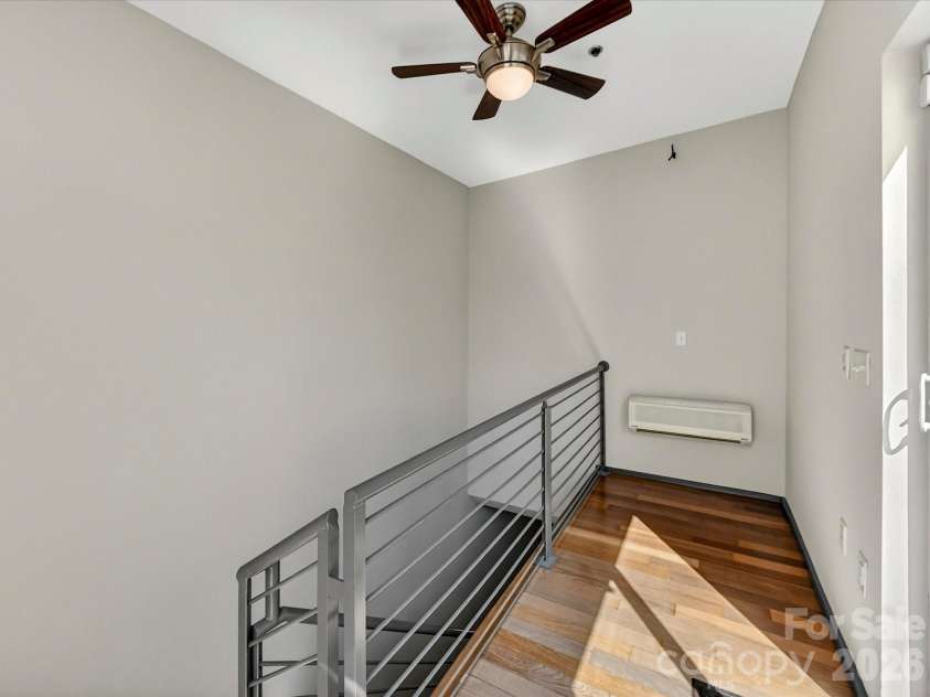285 McDonald Avenue, Charlotte, NC 28203.  MLS# CAR4392788, YatesRealty ID 29915. Third level landing