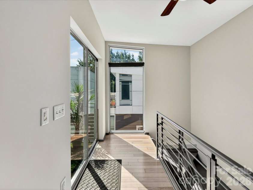 285 McDonald Avenue, Charlotte, NC 28203.  MLS# CAR4392788, YatesRealty ID 29915. Third level landing