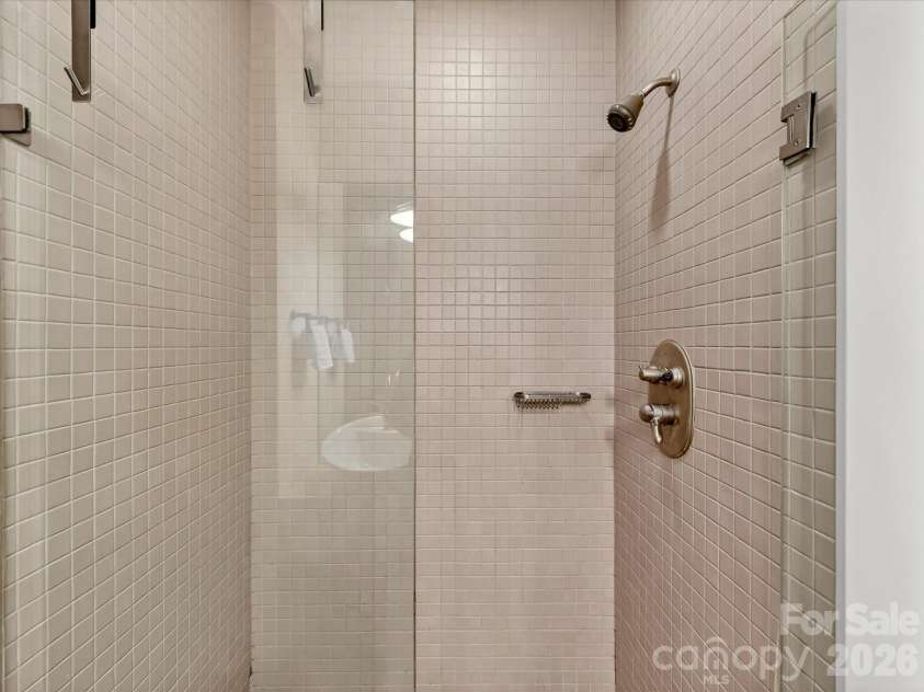 285 McDonald Avenue, Charlotte, NC 28203.  MLS# CAR4392788, YatesRealty ID 29915. Walk-in shower