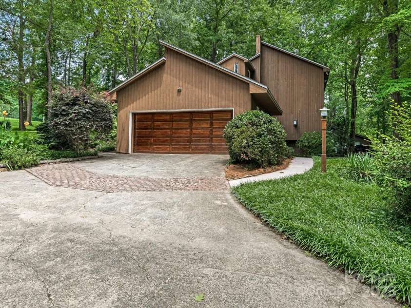 3310 Windbluff Drive, Charlotte, NC 28277.  MLS# CAR4269901, YatesRealty ID 29923. Side Exterior