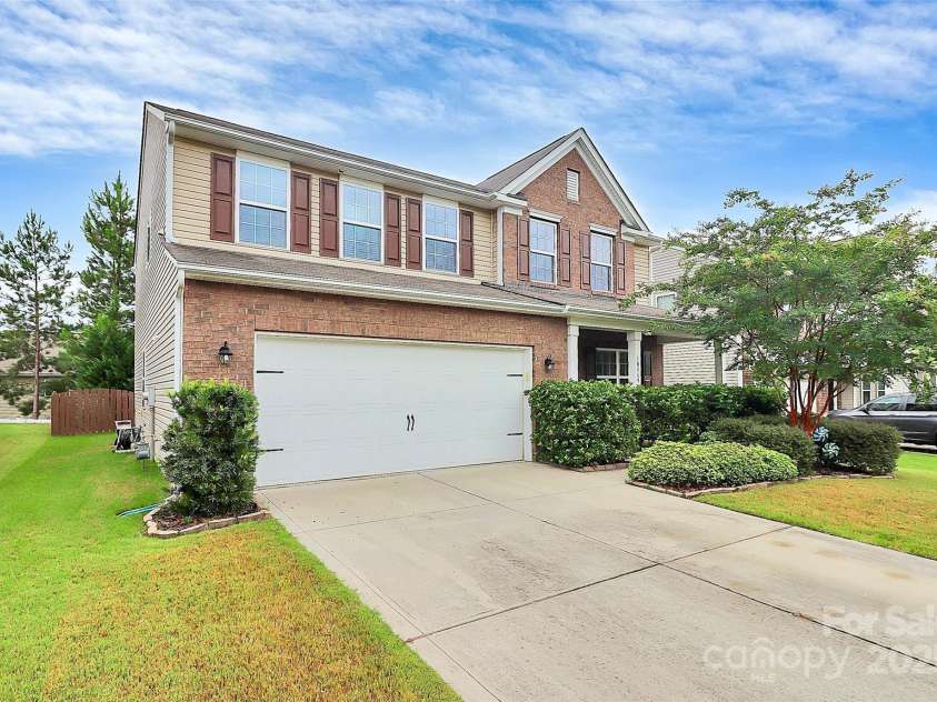 10369 Hillsborough Street, Huntersville, NC 28078.  MLS# CAR4283679, YatesRealty ID 29924. Full private front porch with mature landscaping