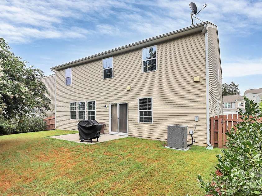 10369 Hillsborough Street, Huntersville, NC 28078.  MLS# CAR4283679, YatesRealty ID 29924. Rear of home with patio