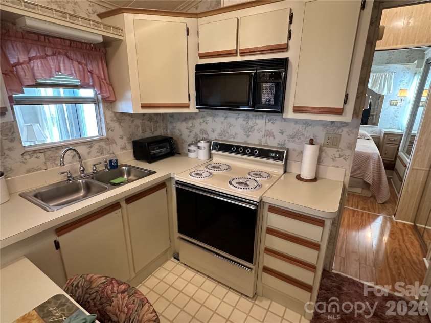 182 Marina Drive, New London, NC 28127.  MLS# CAR4353150, YatesRealty ID 2993. 