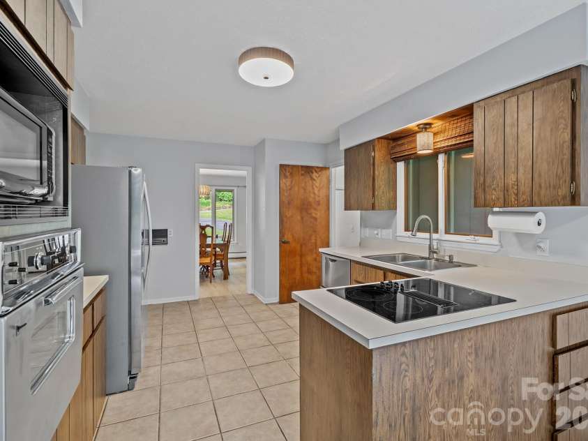 11 Grenadier Court, Candler, NC 28715.  MLS# CAR4388506, YatesRealty ID 29932. 