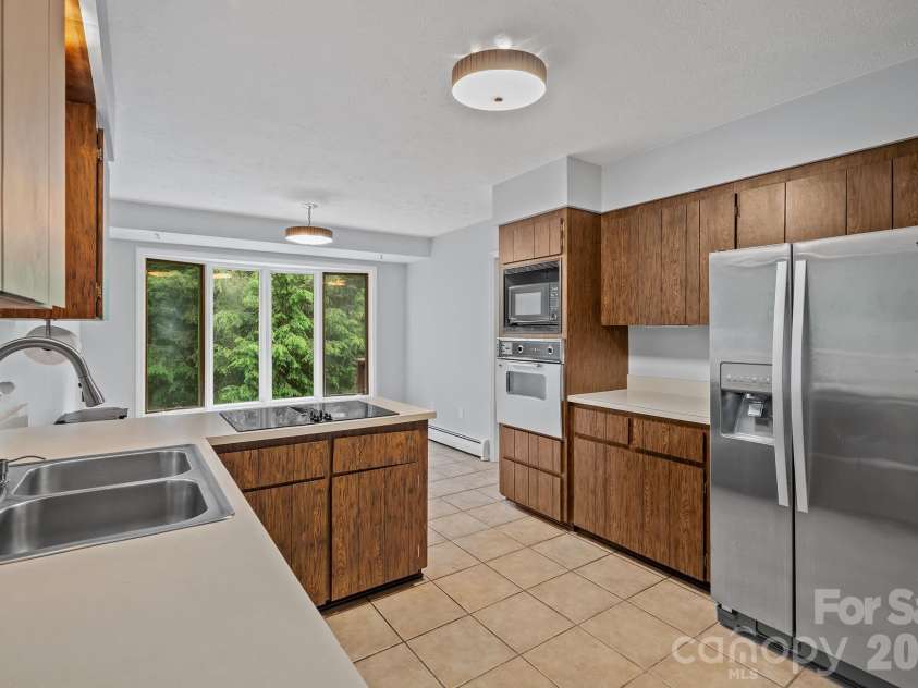11 Grenadier Court, Candler, NC 28715.  MLS# CAR4388506, YatesRealty ID 29932. 