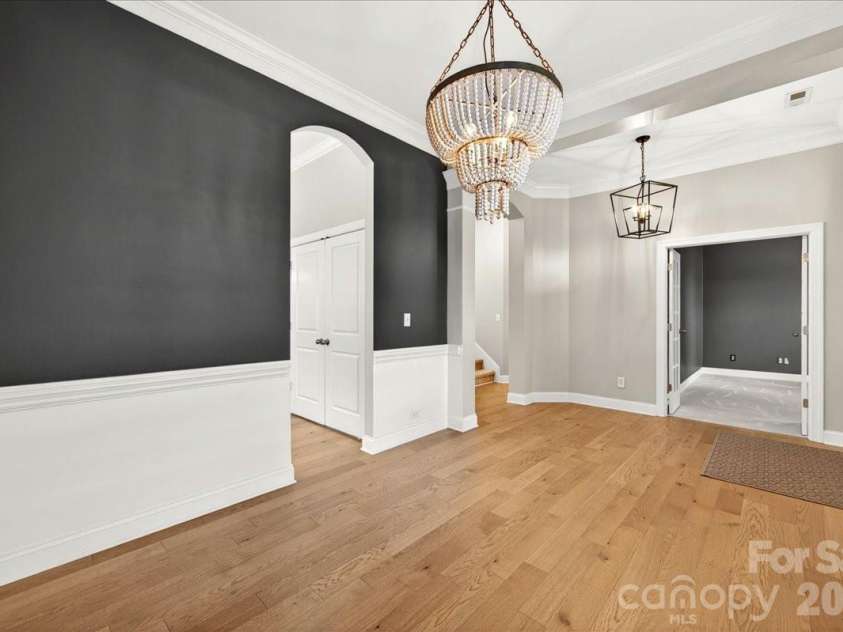 12422 Brenthaven Drive, Davidson, NC 28036.  MLS# CAR4387323, YatesRealty ID 29933. Dining room with view into office/study.