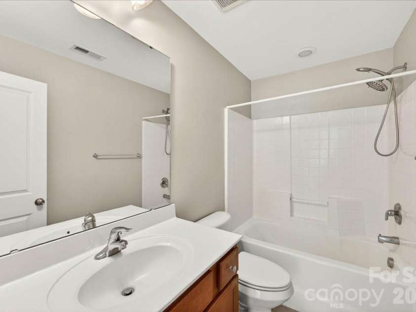 12422 Brenthaven Drive, Davidson, NC 28036.  MLS# CAR4387323, YatesRealty ID 29933. Guest bathroom #2 on upper level.