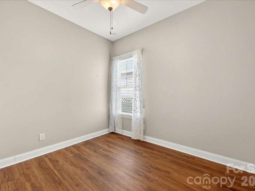 12422 Brenthaven Drive, Davidson, NC 28036.  MLS# CAR4387323, YatesRealty ID 29933. Guest bedroom #1 on main floor.