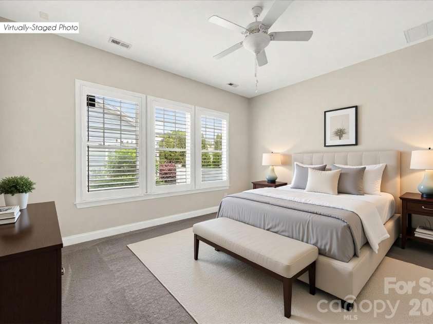 12422 Brenthaven Drive, Davidson, NC 28036.  MLS# CAR4387323, YatesRealty ID 29933. Spacious primary suite on main level with plantation shutters.