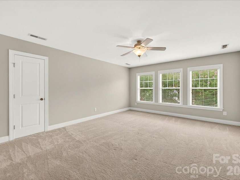 12422 Brenthaven Drive, Davidson, NC 28036.  MLS# CAR4387323, YatesRealty ID 29933. Two additional attic storage areas located on the upper level.