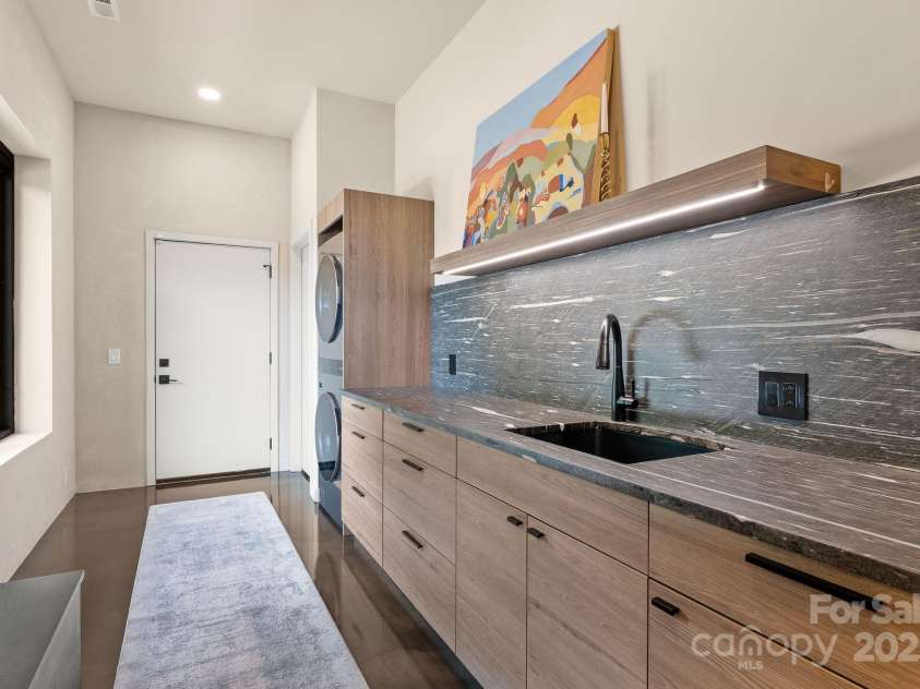 1045 & 1047 Graham Road, Marshall, NC 28753.  MLS# CAR4280943, YatesRealty ID 29941. Entrance to double car garage