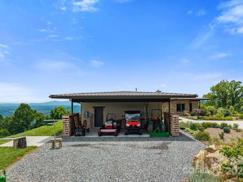 1045 & 1047 Graham Road, Marshall, NC 28753.  MLS# CAR4280943, YatesRealty ID 29941. Tractor/implement garage