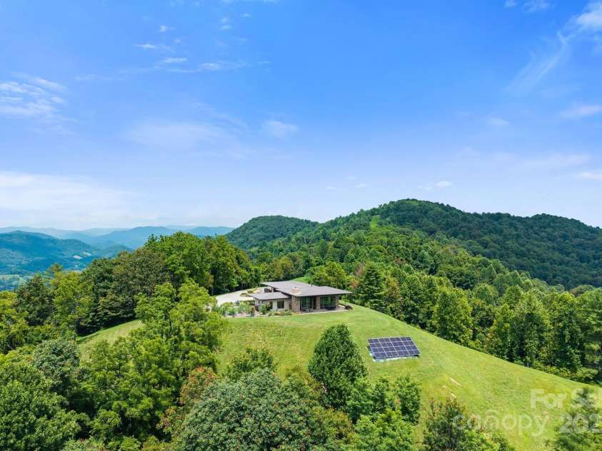 1045 & 1047 Graham Road, Marshall, NC 28753.  MLS# CAR4280943, YatesRealty ID 29941. Welcome to the main house at Majestic Mountain