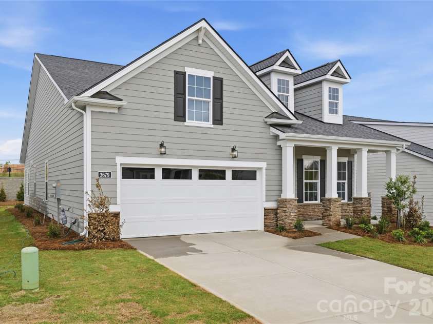 3679 Blue Pine Drive, Indian Land, SC 29707.  MLS# CAR4314020, YatesRealty ID 29947. Charming architecture welcomes you home