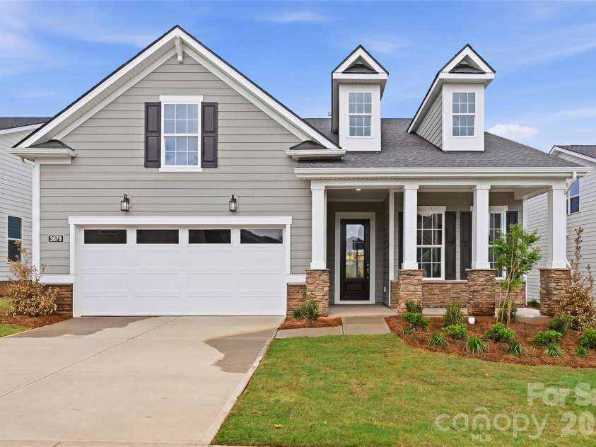 3679 Blue Pine Drive, Indian Land, SC 29707.  MLS# CAR4314020, YatesRealty ID 29947. Charming architecture welcomes you home