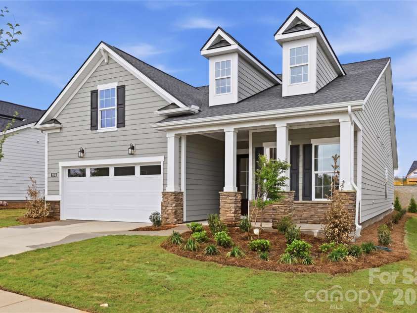 3679 Blue Pine Drive, Indian Land, SC 29707.  MLS# CAR4314020, YatesRealty ID 29947. Charming architecture welcomes you home