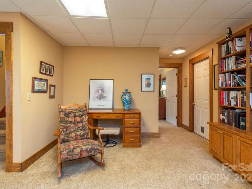4 Galax Lane, Black Mountain, NC 28711.  MLS# CAR4286030, YatesRealty ID 29947. Cozy reading spot