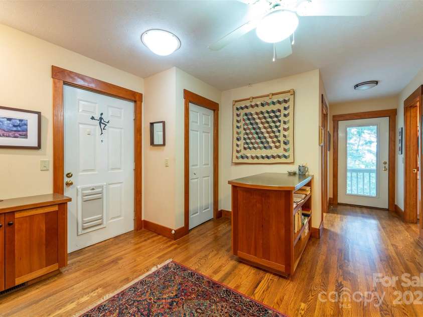 4 Galax Lane, Black Mountain, NC 28711.  MLS# CAR4286030, YatesRealty ID 29947. Entry frm garage,study w/2 custom wood desks.