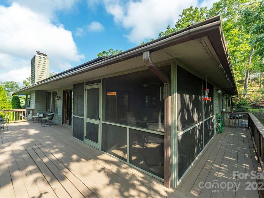 4 Galax Lane, Black Mountain, NC 28711.  MLS# CAR4286030, YatesRealty ID 29947. Huge wrap-around deck.