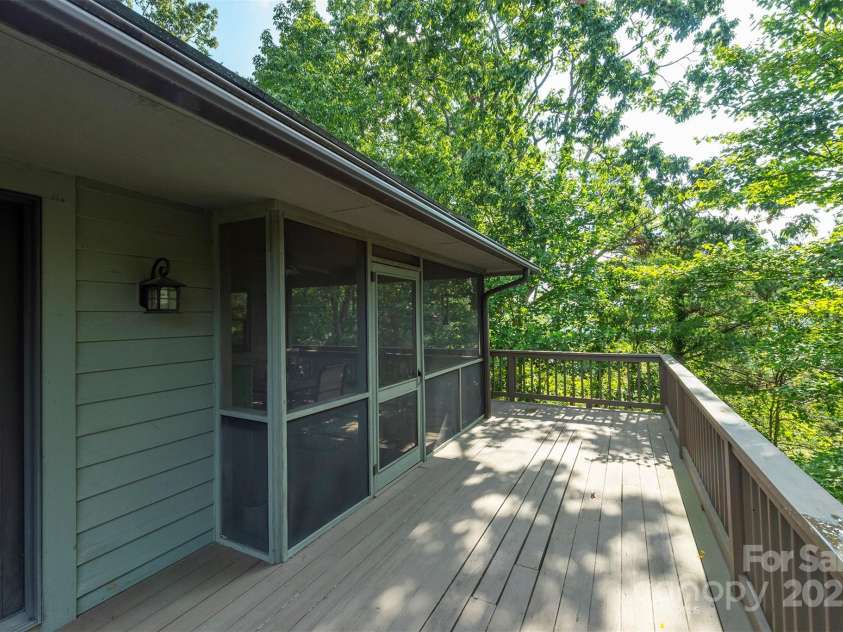4 Galax Lane, Black Mountain, NC 28711.  MLS# CAR4286030, YatesRealty ID 29947. Huge wrap-around deck.