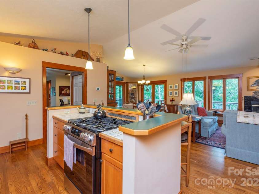 4 Galax Lane, Black Mountain, NC 28711.  MLS# CAR4286030, YatesRealty ID 29947. Kitchen overlooks dining and living areas.
