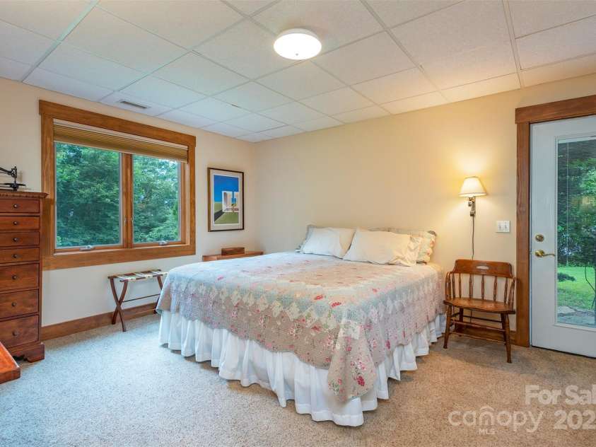 4 Galax Lane, Black Mountain, NC 28711.  MLS# CAR4286030, YatesRealty ID 29947. Lovely room w/door to lower level driveway.