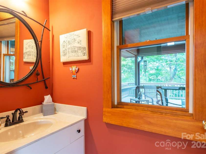 4 Galax Lane, Black Mountain, NC 28711.  MLS# CAR4286030, YatesRealty ID 29947. Mail level 1/2 bath, study & laundry room area